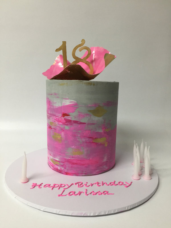 concrete and pink double barrel cake with choc deco