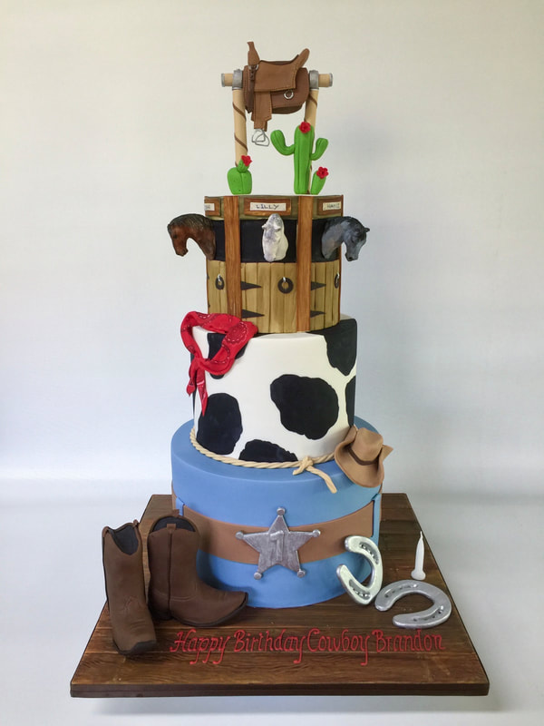 3 tier cowboy themed cake