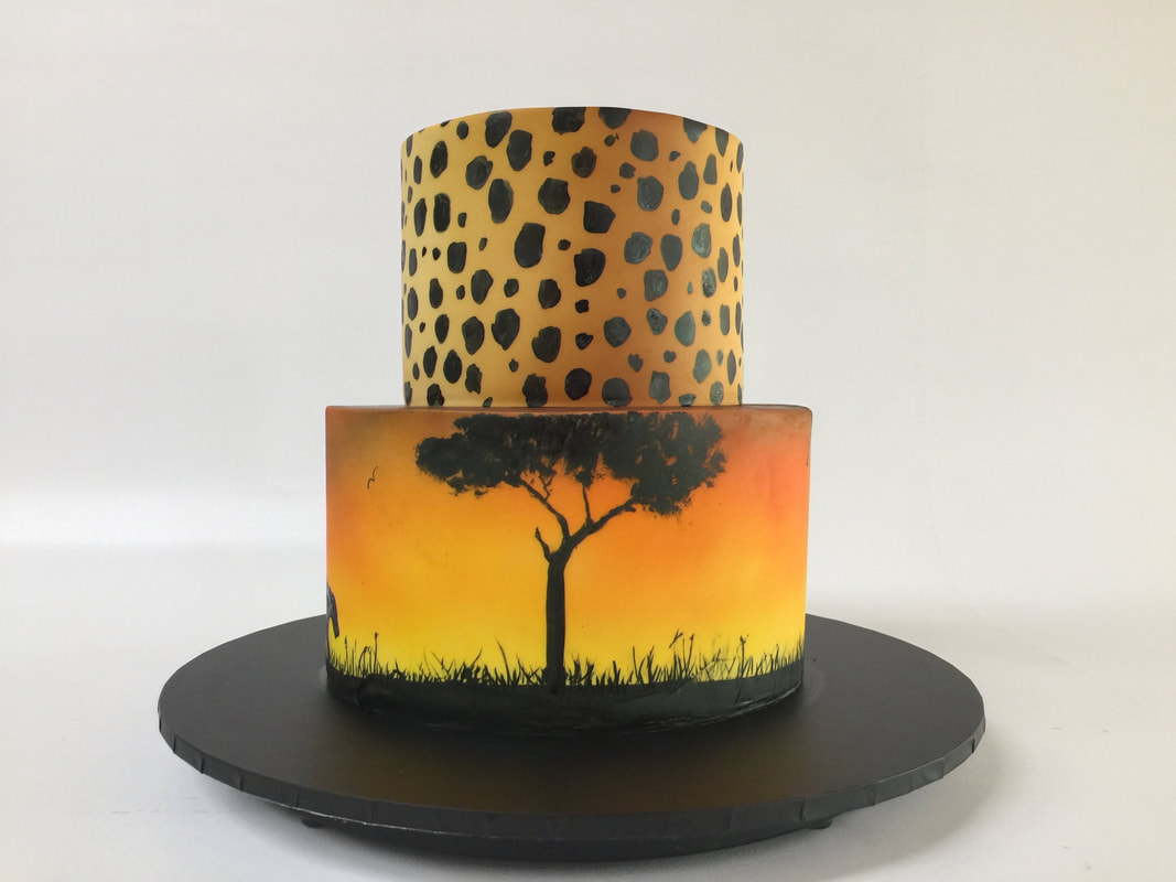 painted jungle silhouette cake