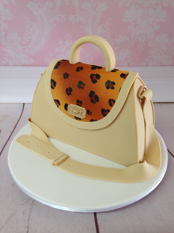 handbag cake with leopard print