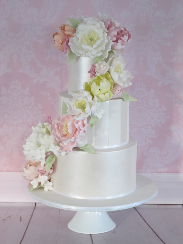 Spring flower cascade wedding cake