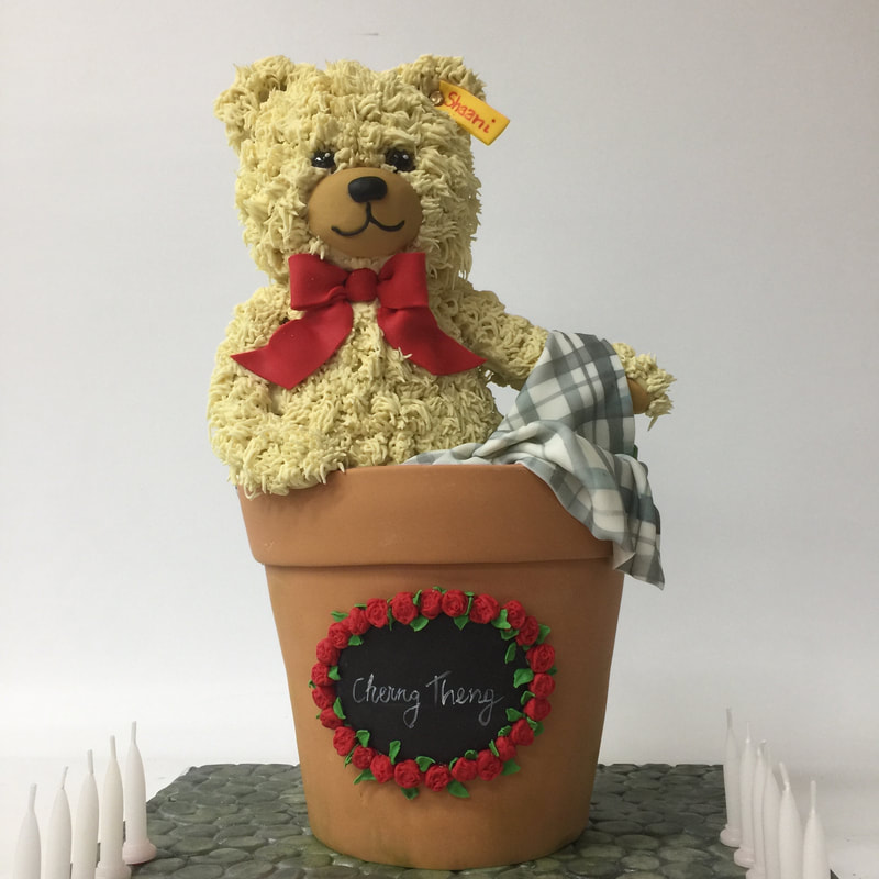 teddybear  in flowerpot cake